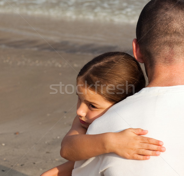 Portrait of a cute Daughter Hugging his father on the beach Stock photo © wavebreak_media