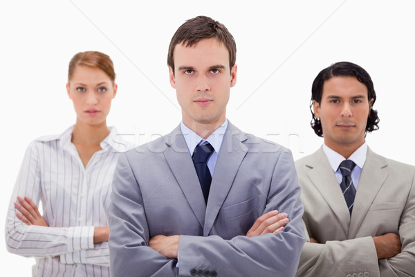 Confident businesspeople with arms folded against a white background Stock photo © wavebreak_media