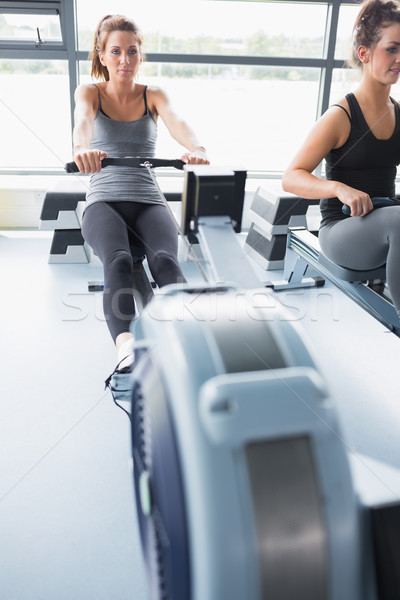 Femme aviron machine gymnase sport santé [[stock_photo]] © wavebreak_media