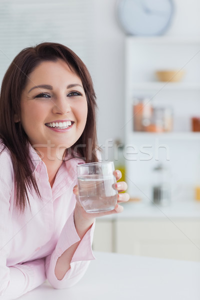Portre genç kadın cam su mutfak Stok fotoğraf © wavebreak_media