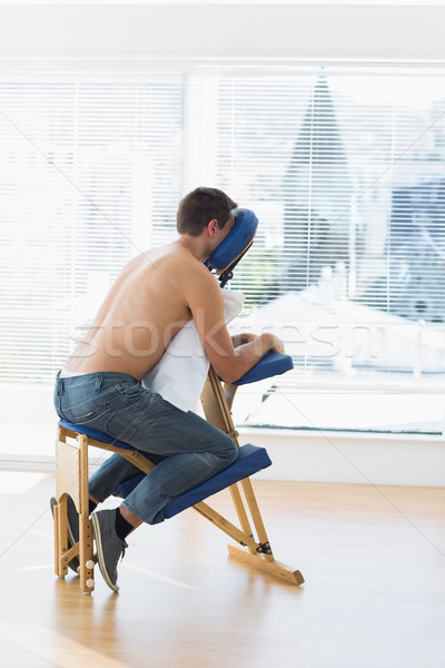 Patient sitting on massage chair  Stock photo © wavebreak_media