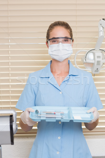 Zahnärztliche Assistent blau halten Fach Werkzeuge Stock foto © wavebreak_media