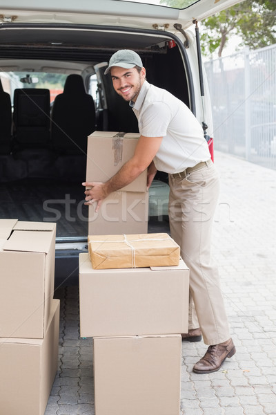 Delivery driver loading his van with boxes  Stock photo © wavebreak_media