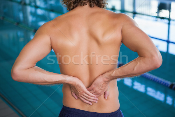 Shirtless Schwimmer zurück Schmerzen Pool Stock foto © wavebreak_media
