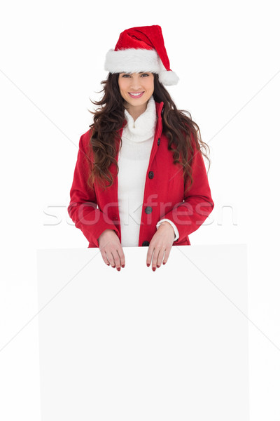 Cheerful brunette showing white poster Stock photo © wavebreak_media