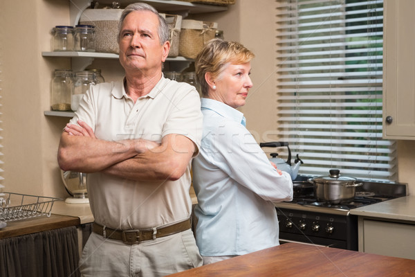 Pareja de ancianos argumento casa cocina mujer casa Foto stock © wavebreak_media