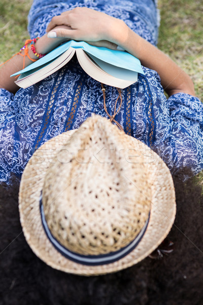 Pretty young woman napping in park Stock photo © wavebreak_media