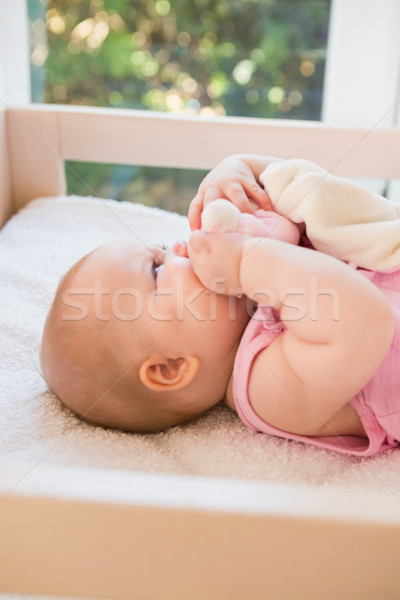 Beautiful cute baby girl in her bed  Stock photo © wavebreak_media
