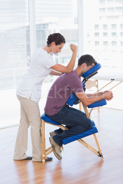 Homme Retour massage médicaux bureau femme [[stock_photo]] © wavebreak_media