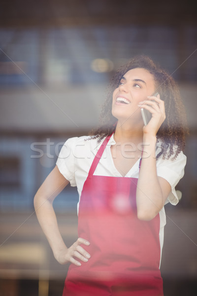 Gülen garson konuşma telefon kahvehane iş Stok fotoğraf © wavebreak_media