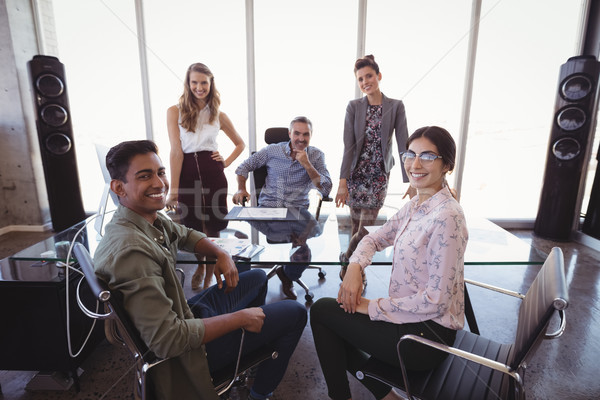 Portrait of businessman with young creative team Stock photo © wavebreak_media