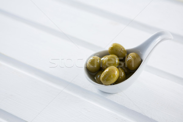 Gemarineerd groene olijven lepel tabel Stockfoto © wavebreak_media