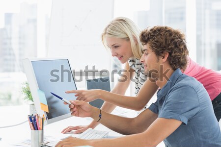 üzletemberek laptopot használ számítógépek ül fa asztal iroda Stock fotó © wavebreak_media