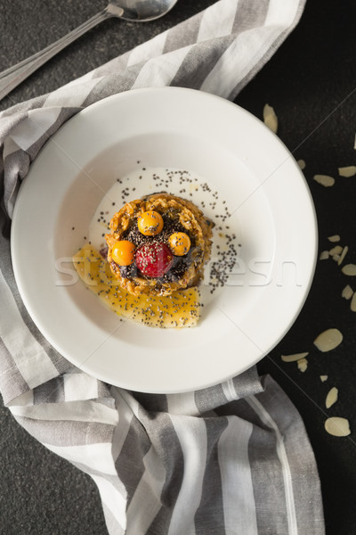 Plate of breakfast cereals with fruits Stock photo © wavebreak_media