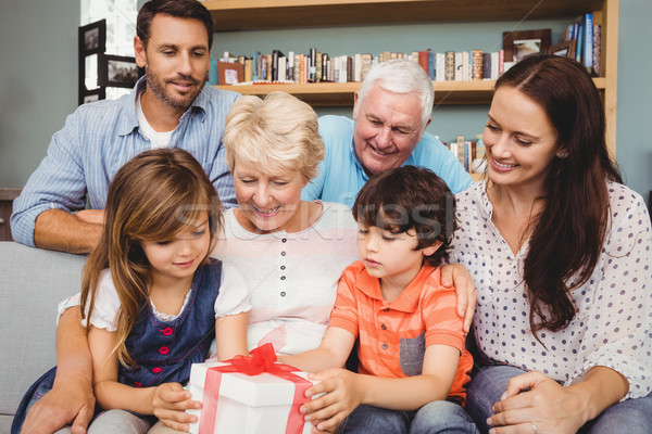 Famille heureuse coffret cadeau maison famille fille amour [[stock_photo]] © wavebreak_media