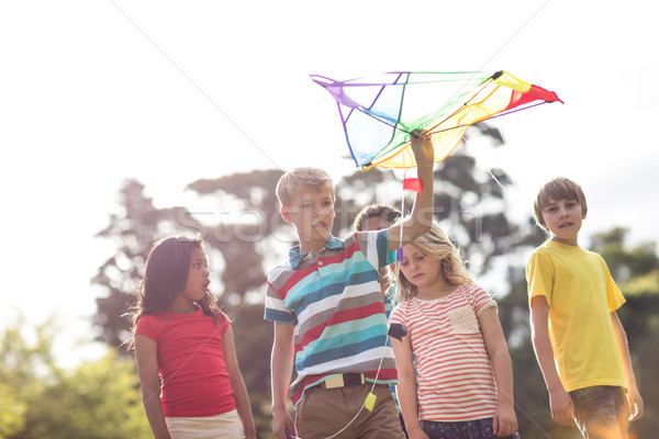 Heureux enfants jouer kite parc amusement [[stock_photo]] © wavebreak_media