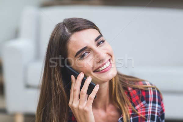 Gyönyörű nő beszél telefon portré otthon nő Stock fotó © wavebreak_media