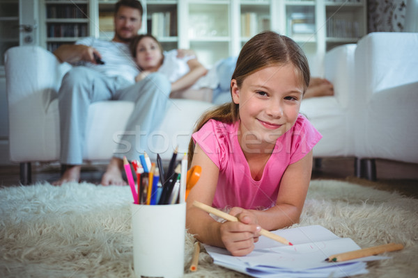 Meisje vloer tekening ouders vergadering sofa Stockfoto © wavebreak_media