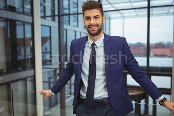 Portret przystojny biznesmen stałego korytarz biuro Zdjęcia stock © wavebreak_media