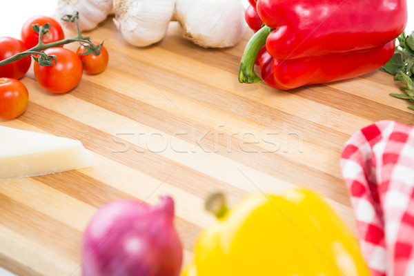 Közelkép zöldségek vágódeszka piros főzés gyönyörű Stock fotó © wavebreak_media