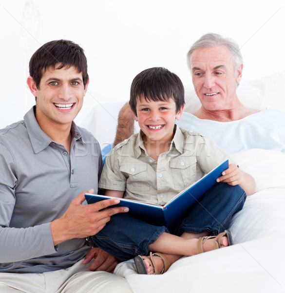 Stock photo: Affectionnate father and son visiting grandfather 