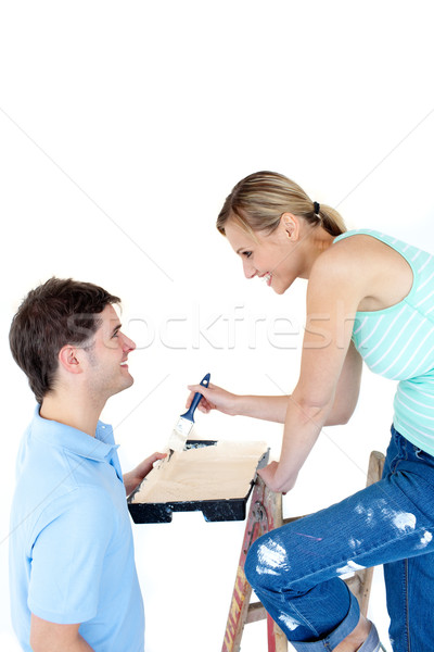 Happy couple painting a room in their new house  Stock photo © wavebreak_media