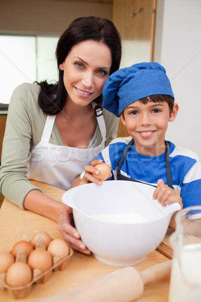 Son and mother baking cake together Stock photo © wavebreak_media