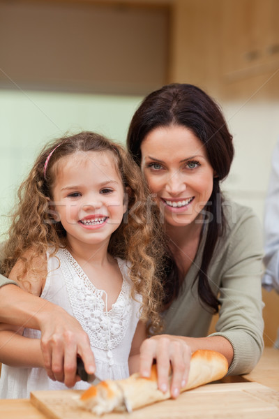 Madre hija pan junto alimentos Foto stock © wavebreak_media