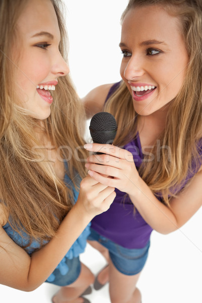 Coup deux heureux jeunes beauté chanter [[stock_photo]] © wavebreak_media