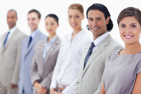 Primer plano sonriendo equipo de negocios mirando recto enfoque Foto stock © wavebreak_media
