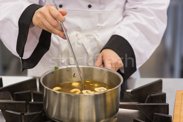 Soup being stirred by chef in kitchen Stock photo © wavebreak_media