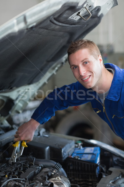 Mechanic working on car engine Stock photo © wavebreak_media