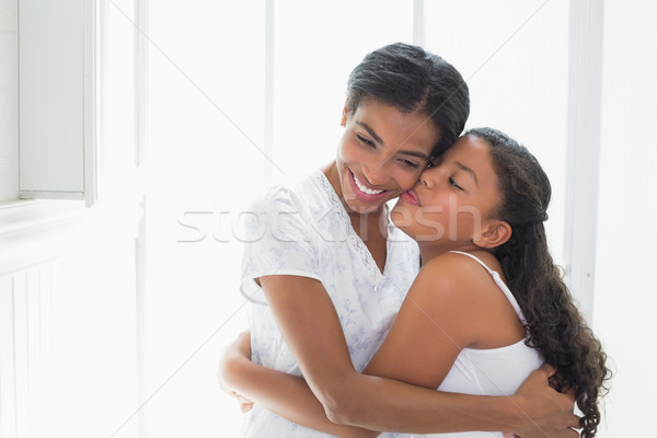 Mother and daughter embracing in the morning Stock photo © wavebreak_media