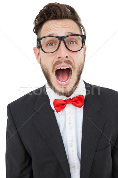 Nerdy businessman shouting with mouth open Stock photo © wavebreak_media