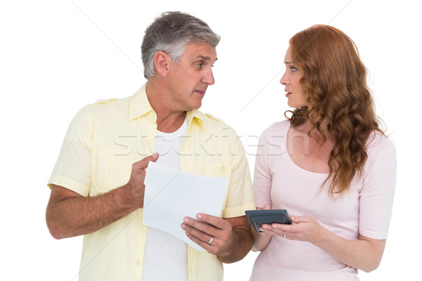 Casual couples working out their bills Stock photo © wavebreak_media