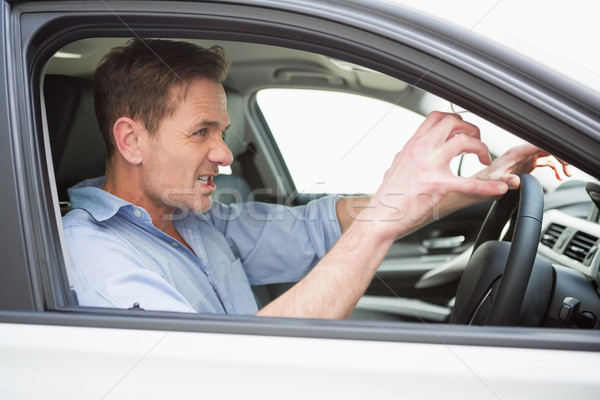 Bel homme route voiture fenêtre shirt [[stock_photo]] © wavebreak_media