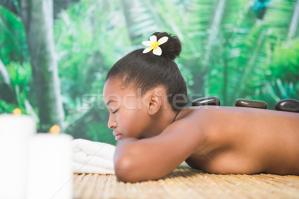 Csinos nő élvezi forró kő masszázs gyógyfürdő Stock fotó © wavebreak_media