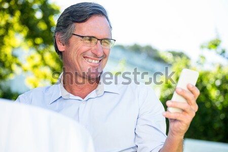 Smiling vintner examining wine Stock photo © wavebreak_media