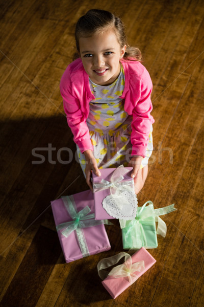 Girl with various gift boxes at home Stock photo © wavebreak_media