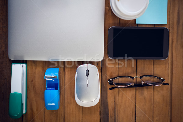 Portable table en bois ordinateur souris [[stock_photo]] © wavebreak_media