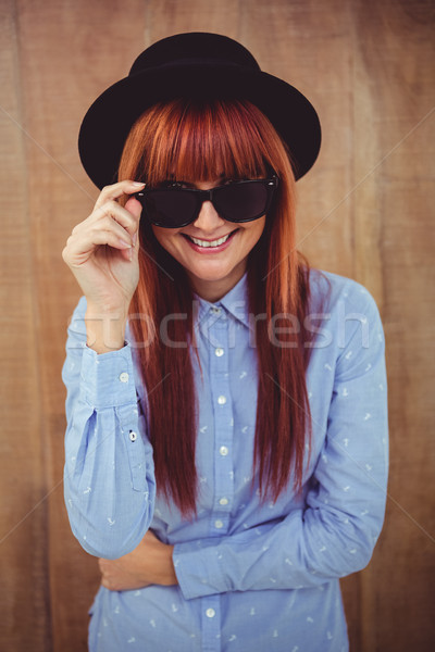 Smiling hipster woman posing face to the camera Stock photo © wavebreak_media