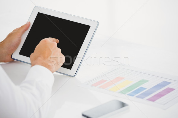 Businessman using digital tablet Stock photo © wavebreak_media