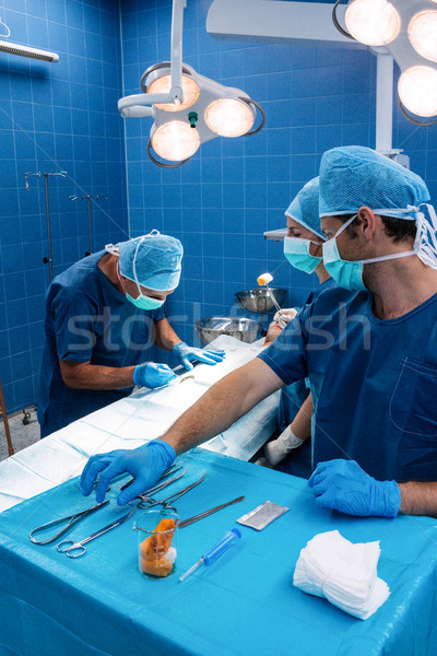Surgery team operating a patient in an operating room Stock photo © wavebreak_media