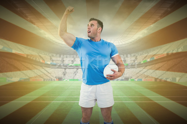 Composite image of rugby player cheering with the ball Stock photo © wavebreak_media