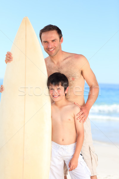 Father and son with their surfboards Stock photo © wavebreak_media