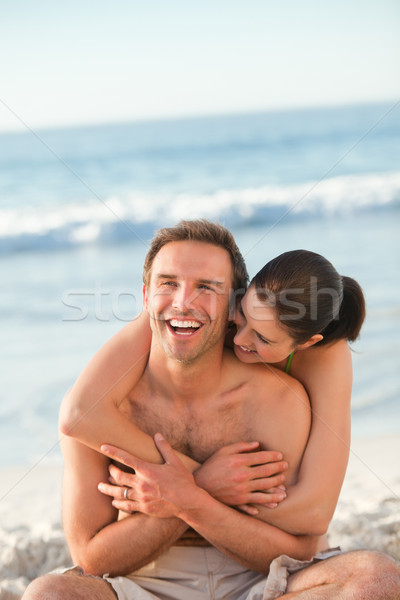 Enamored couple hugging on the beach Stock photo © wavebreak_media