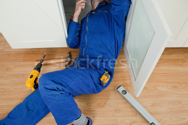 ремонта человека что-то полу дома Сток-фото © wavebreak_media