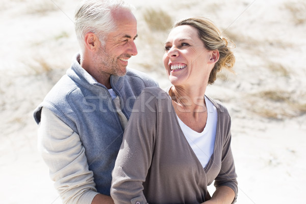 Heureux couple plage regarder autre [[stock_photo]] © wavebreak_media