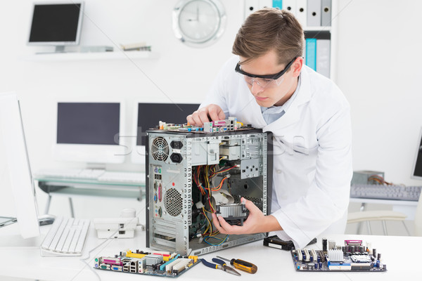 Jungen Techniker arbeiten defekt Computer Büro Stock foto © wavebreak_media