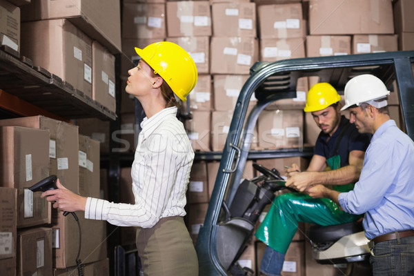 Warehouse team working during busy period Stock photo © wavebreak_media